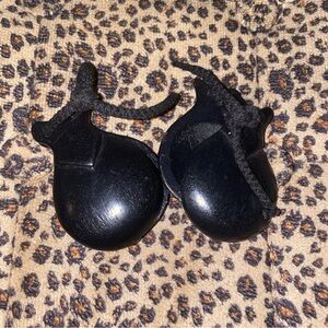 black wooden castanets